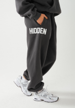 donkergrijze joggingbroek met omgeslagen rand in oversized fit